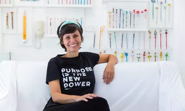 Photo from the O Globo story on IMPACTO, with the Purpose is the New Power T-shirt